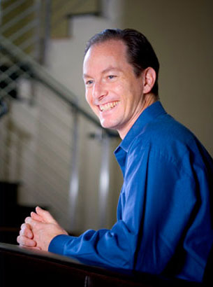 Christopher de Charms - Omneuron, Menlo Park, CA - I was shooting a journalism shot for the Silicon Valley Biz Ink when Christopher asked me to take his portrait. This off-the-cuff shot lets us all know that even in the realms of MRI scans and serious medicine, joy and spontaneity are contagious.