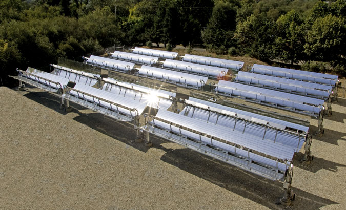 Cogenra - I took this shot from the roof of an adjacent building. A climbing harness kept me from falling as I leaned over the edge of the building to expose the array. We waited until the sun was in just the right position, and then moved the array back and forth to get the proper reflection.