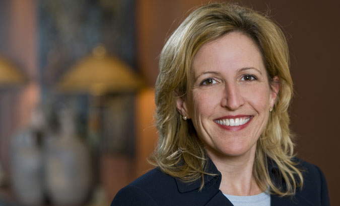 Kathryn Spelman - Attorney at Law – Principal and civil litigator at Mount, Spelman & Fingerman. In this environmental portrait, I used lights in the background to create a “live office feel.”